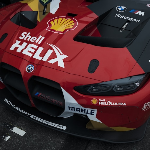 A red BMW M3 close up of bonnet with SHELL HELIX logo