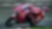 A red Ducati MotoGP bike taking a sharp turn on a race track